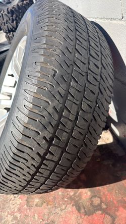 Used All-Terrain Tire on Rim