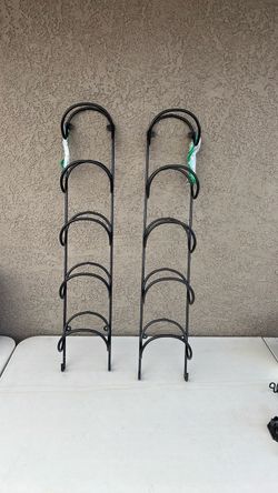 Wallniture Moduwine Storage Rack, featuring a black wrought iron