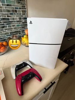 PlayStation 5 Slim Console with Two Controllers