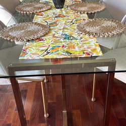 Table 36x72 and four chairs