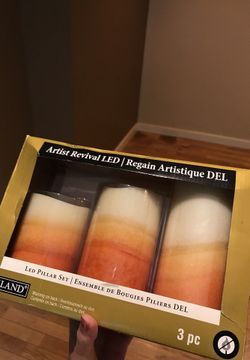 LED Pillar set $15 per box I have 3 boxes with 3 candles inside
