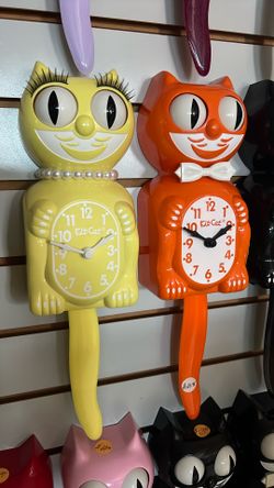 Yellow Female Kit Cat Clock