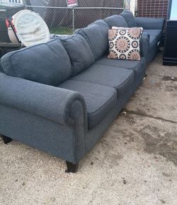 Denim blue loveseat and 3 seater sofa in good conditions