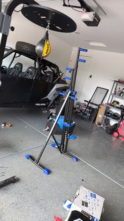 Vertical climbing machine