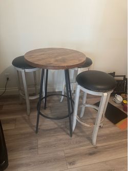Bistro table and 3 bar stools