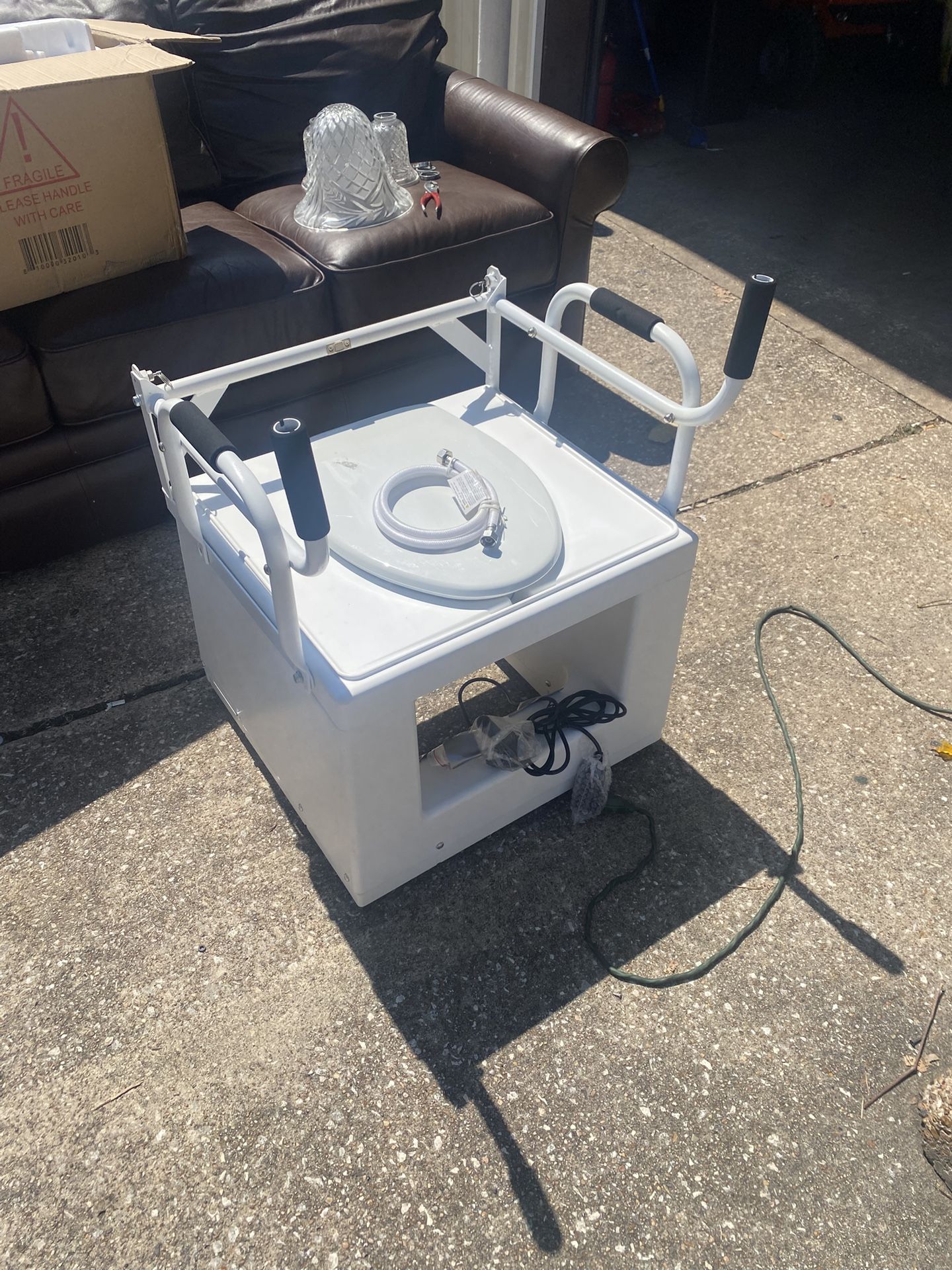 POWER TOILET LIFT CHAIR FROM THRONE BUTLER