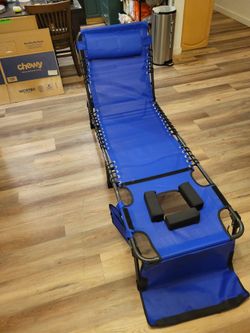 Folding chair with a hole for your head