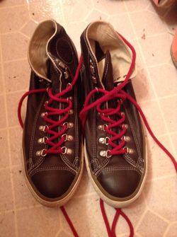 Brown leather converse