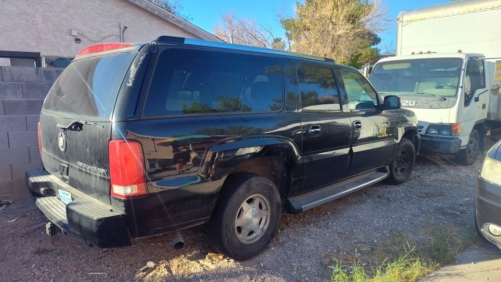 Parts ONLY off 03 Escalade AWD, No Engine or Trans, Good Body and Interior Parts, and Lots More.