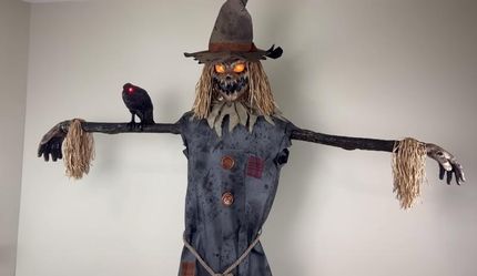 Haunted Living 7.5-ft Lighted Talking Scarecrow Motion Activated Halloween Animatronic