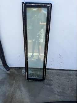 Bronze anodized aluminum dual pane fixed window