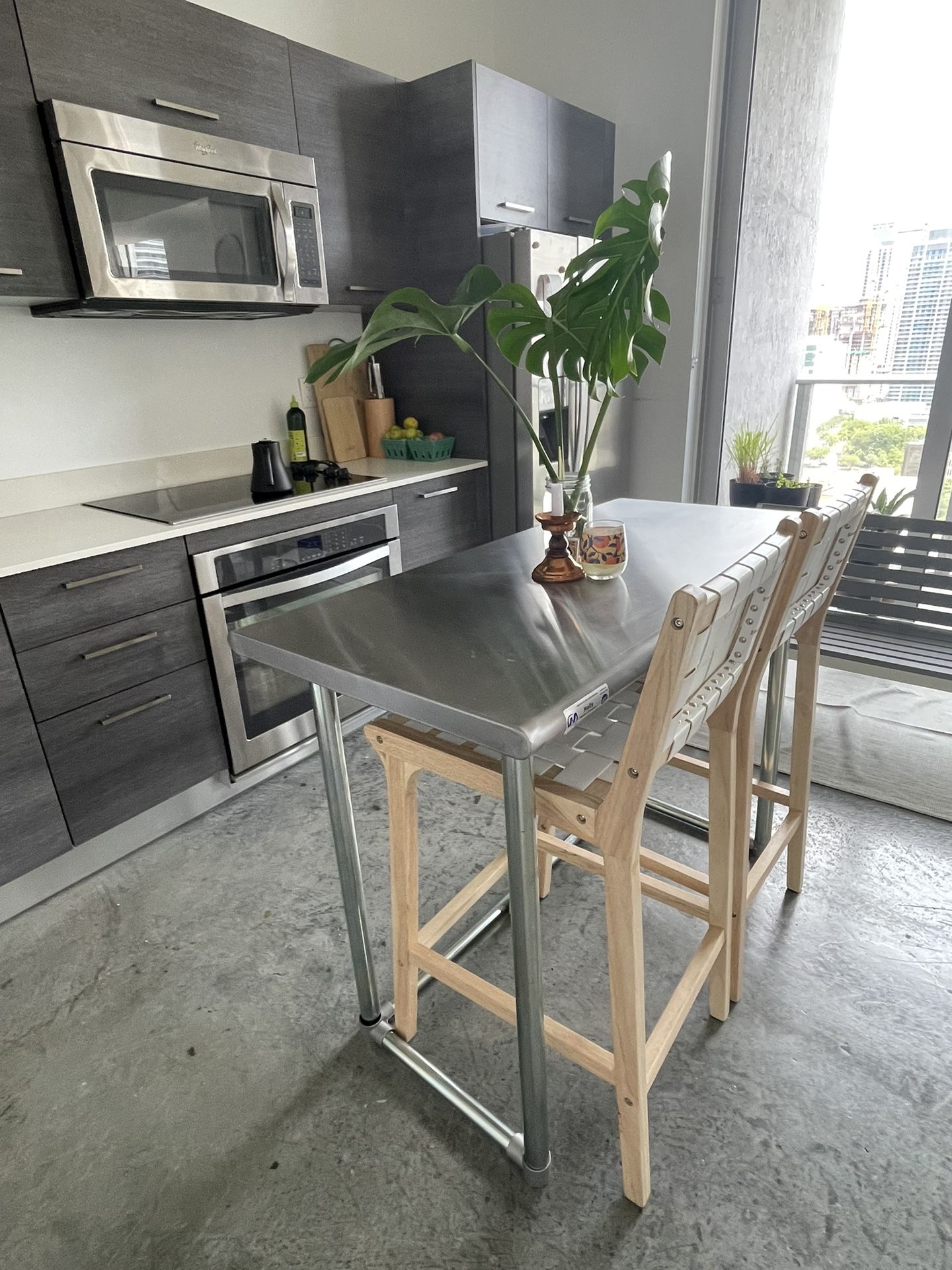 Stainless Steel Bar Table and Wooden and Leather Strap Bar Chairs