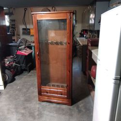 Cabinet holds six and locks