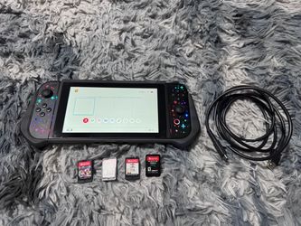 Nintendo Switch w/ 4 games