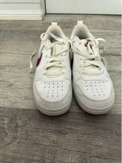 Purple and white girls nike shoes