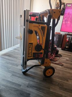 DEWALT 10"TABLE SAW..WITH STAND LIKE NEW.