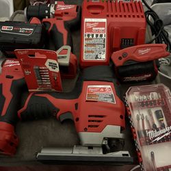 Package of Milwaukee power tools/battery/charger