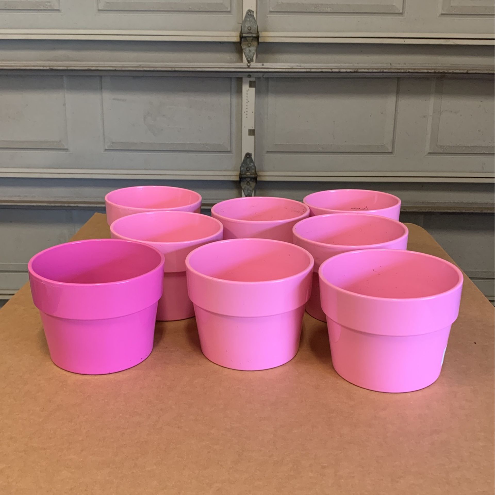 Eight 6” Wide Pink Ceramic Pots
