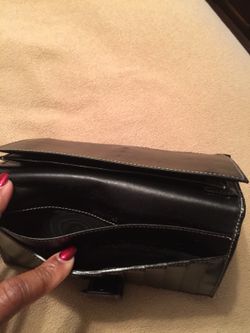 Black Gucci wallet.