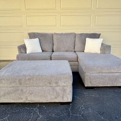 Gray Reversible Living Spaces Sectional Couch With Ottoman & Storage