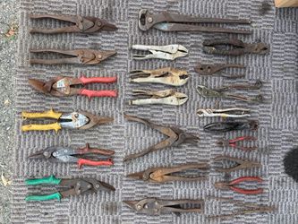 Vintage pliers, tin snips, vice grips, wire cutters, etc. Vintage pliers, tin snips, vise grips, wire cutters, etc.