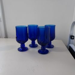 4 Piece  Beautiful Blue Glassware. 