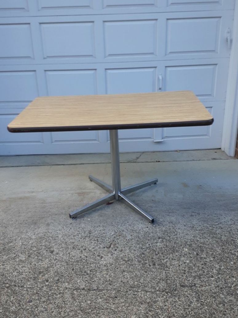Table kitchen heavy duty. Solid. Metal Legs. 48in x 30in.