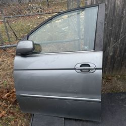 2002 Honda Odyssey Drivers Door, Fender, Bumper Support Brace, Head Light, And Grille 