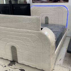 New King Bed W Mattress , tv Lift, LED Light, And Fire Place Display 