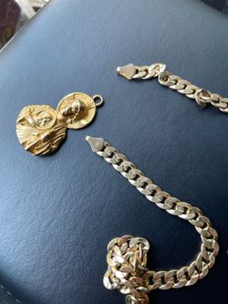 14 k gold cubin with 10 k San Judas pendant