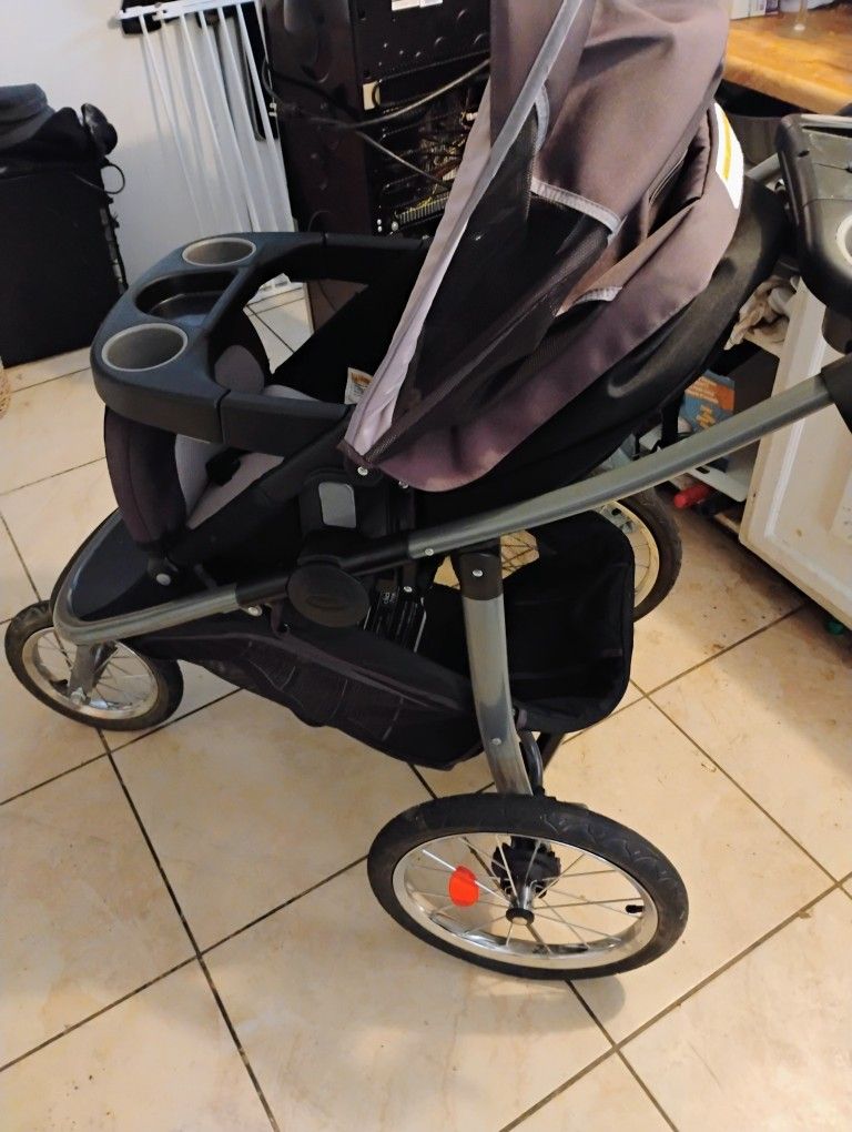 A Two Seater Jogger Baby Stroller With Detachable Seat