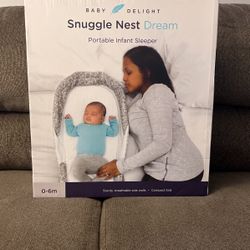 Portable Infant Sleeper. 