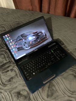 A BIG 17.3" AMD A6 Toshiba Laptop, 640GB HDD, 4GB RAM. HDMI, DVD📀, SD Card Reader & a WebCam. It Has a Little Dropped Or Dents As Seen In The Picture