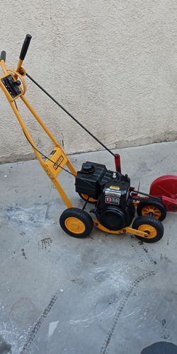 Mcline 3.5 HP  Edged Trimmer. In Excellent Condition Like New 