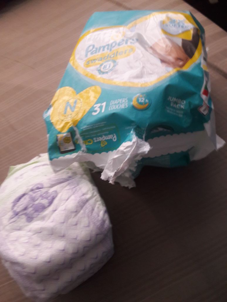 Pampers and Luvs newborn diapers