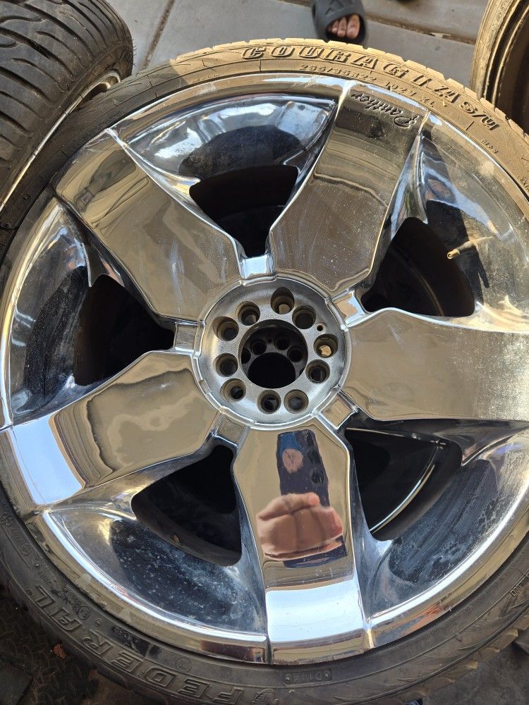 22 universal rims w tires.