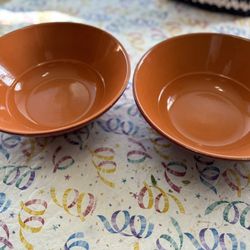 Tow Bowls One Side Orange And The Other Side Bergandy  