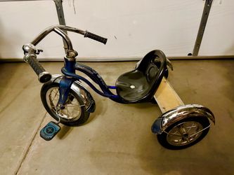 Toddler blue Schwinn tricycle, rebuilt