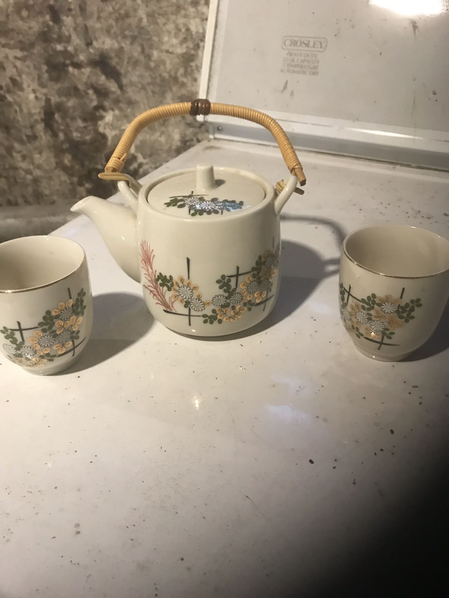 Variety of tea pots and wall art