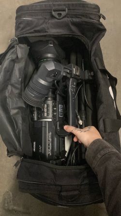 JVC video recorder jvc gy-hd110 minidv 720p  external usb, and tripod stand with bag
