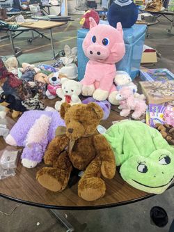 Variety Of Stuffed Animals And Pillow.