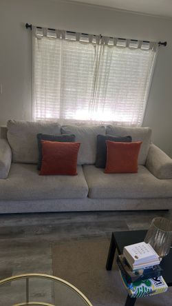 Ashley sleeper couch off white/ grey