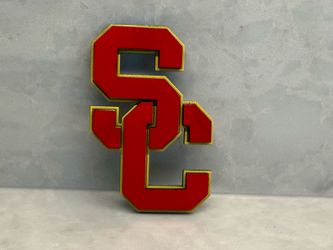 Layered wooden signs of local teams