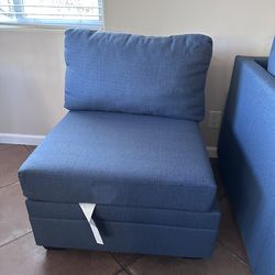 Living spaces single piece with ottoman