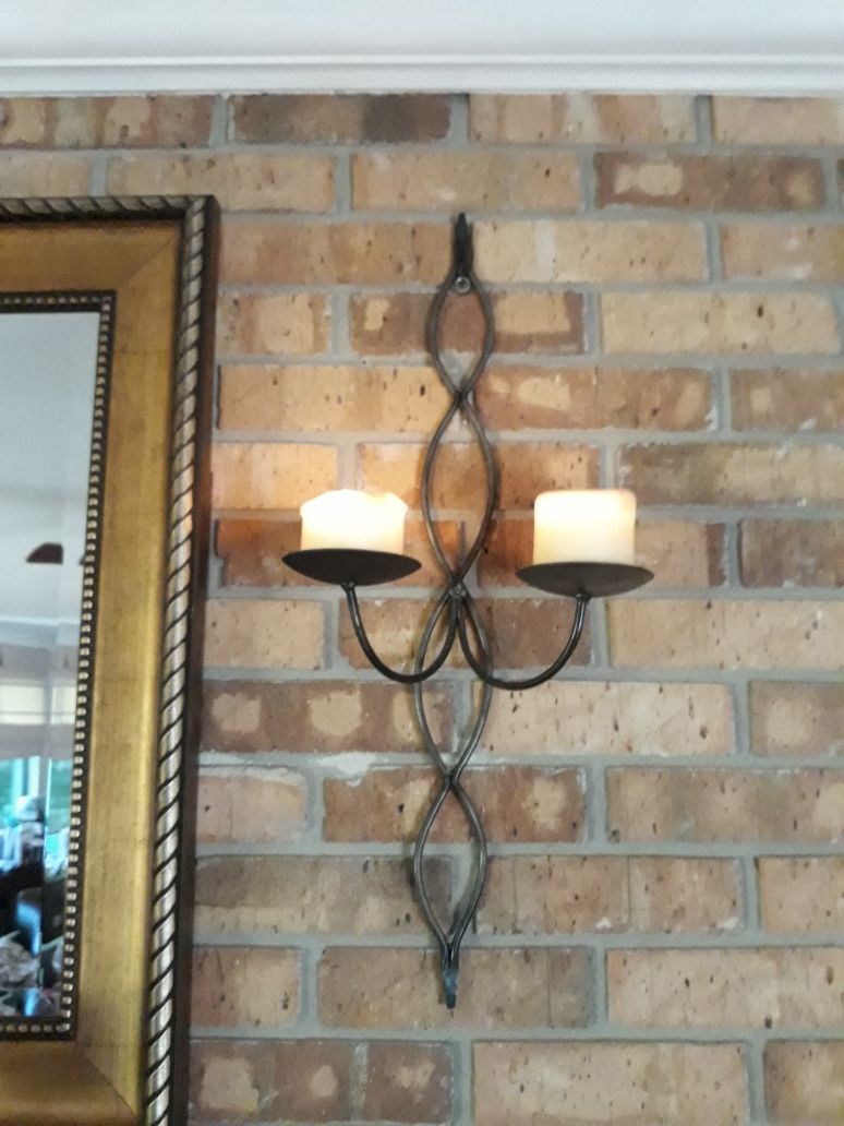 Pair of rod iron candle sconces.