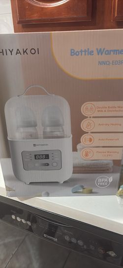 Double bottle warmer