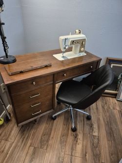 Singer sewing machine needs a little work 85.00  firmj