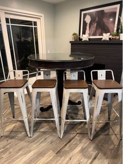 Dining table and 4 barstool chairs