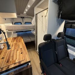 2023 Ford Transit 350 HR Ecoboost AWD Seats/Sleeps 4, 880W Solar, 5kWH