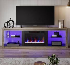 Tv stand with 23in” electric fireplace, fits up to 75in tv